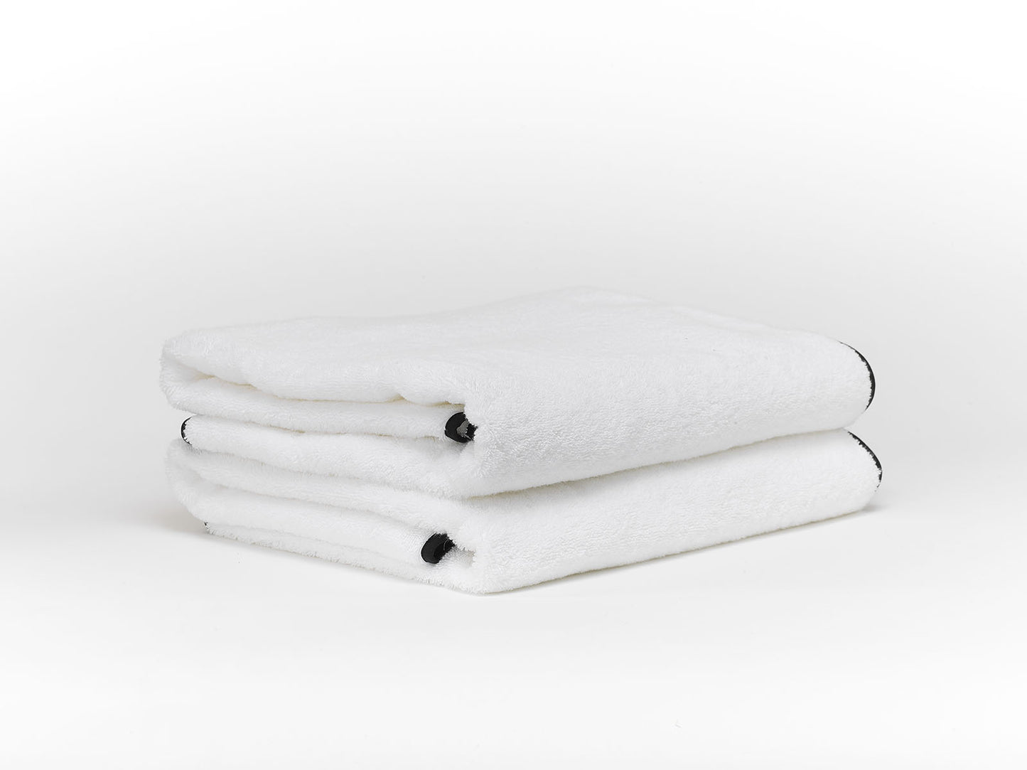 Serviette éponge avec biais Manhattan Brodline