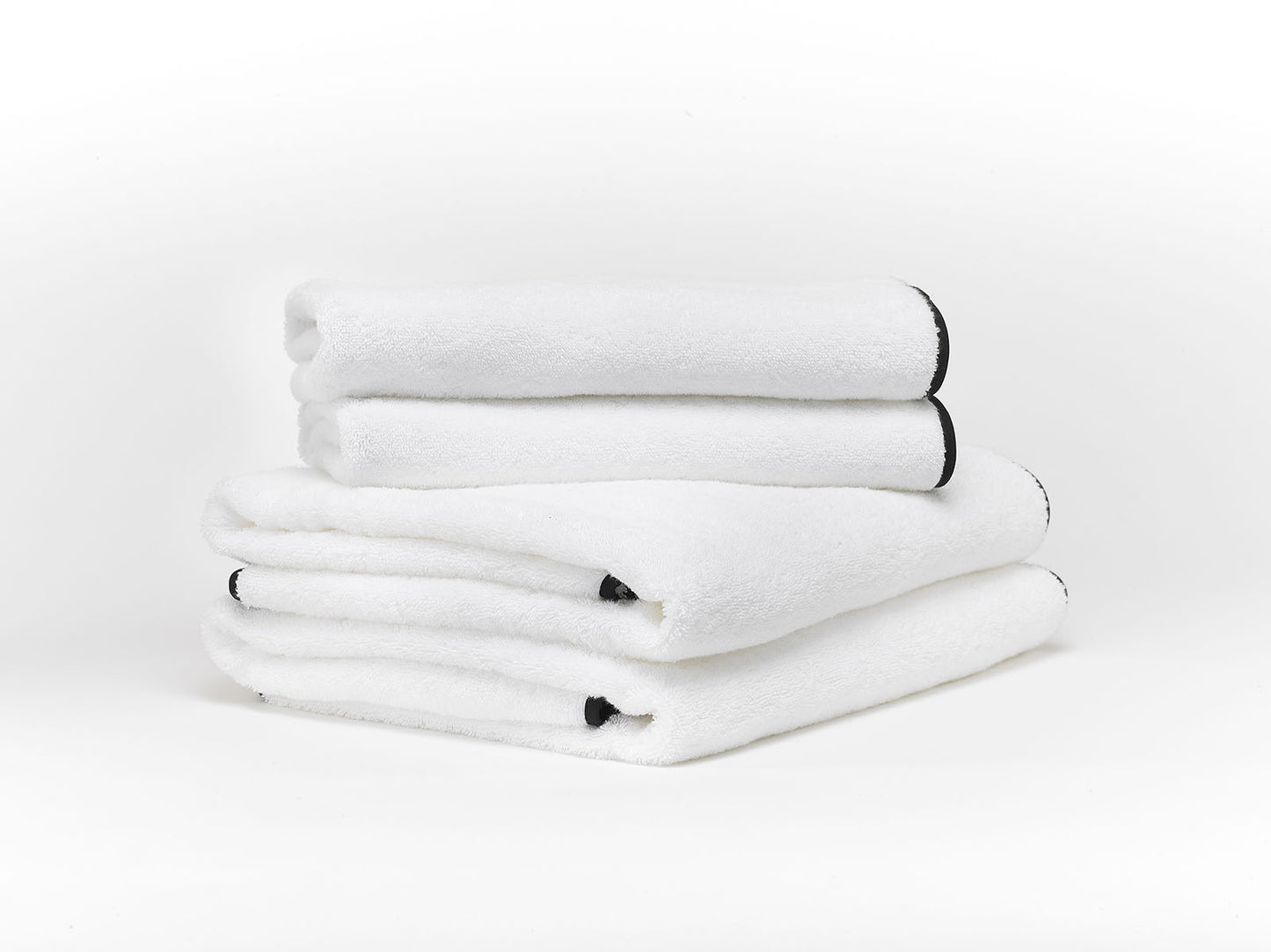 Serviette éponge avec biais Manhattan Brodline