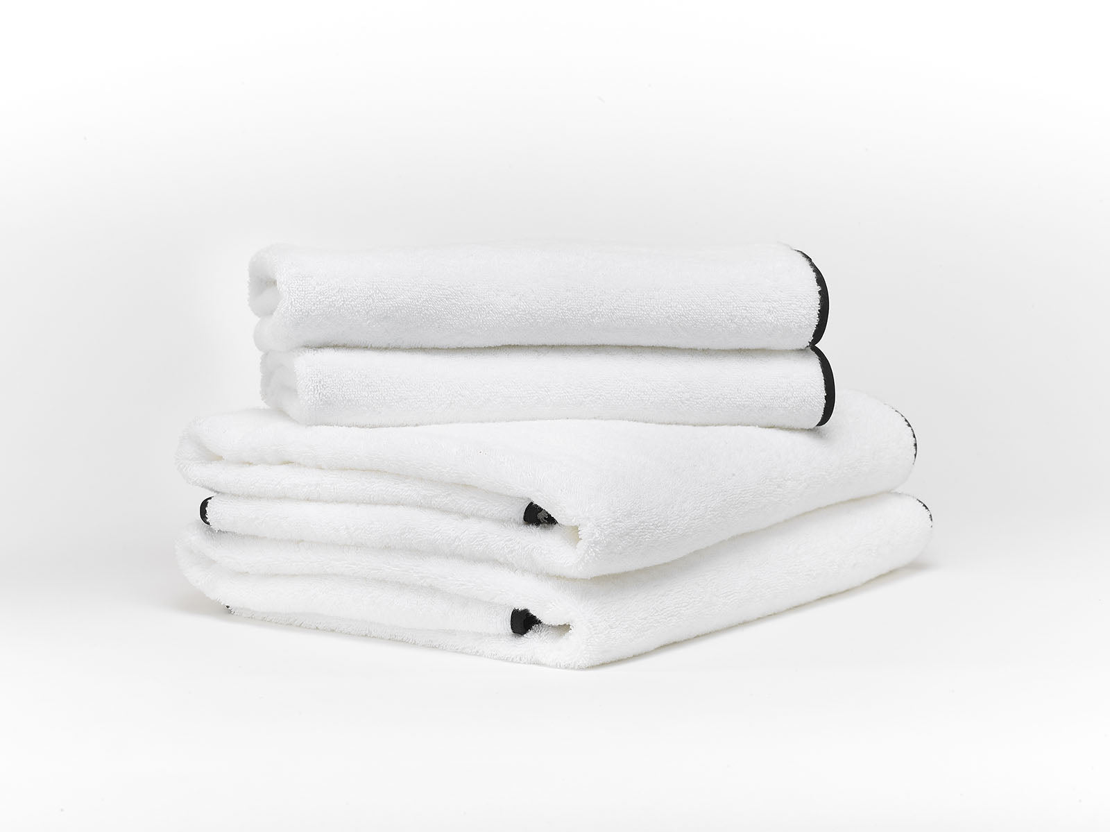 Serviette éponge avec biais Manhattan Brodline
