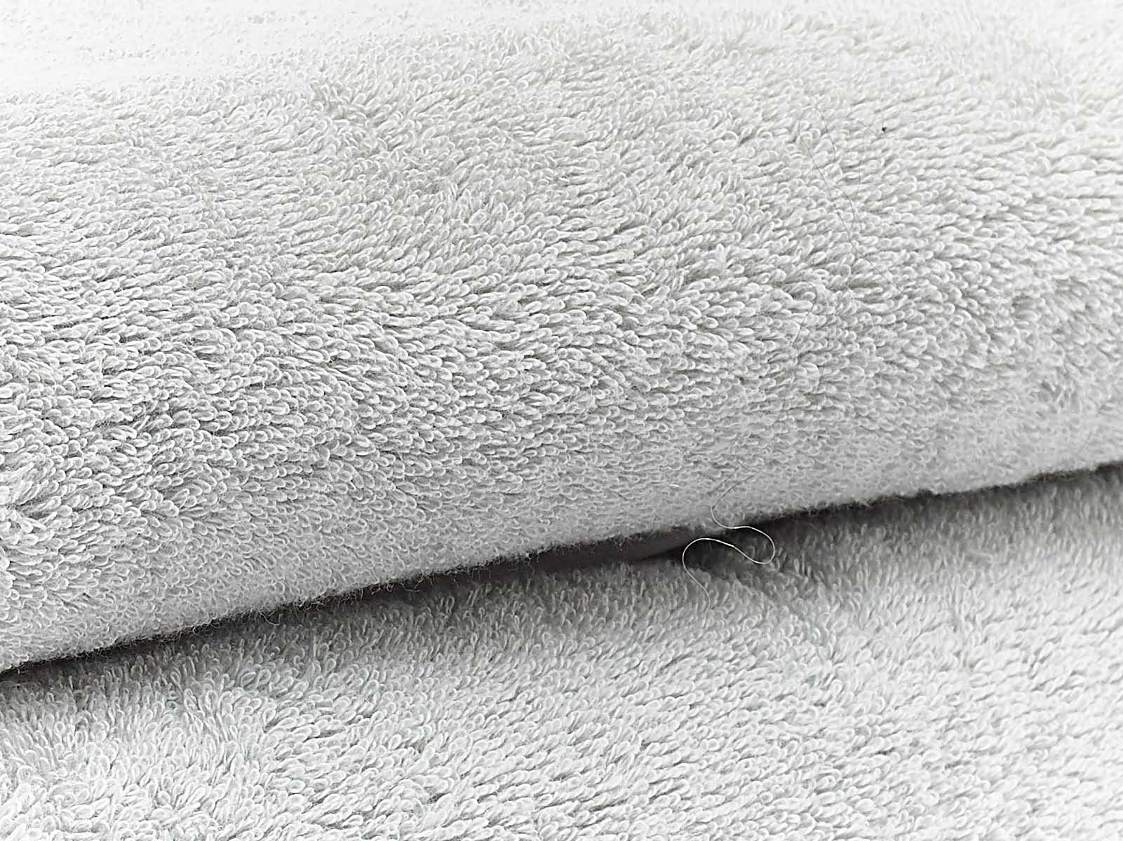 Serviette éponge avec biais Manhattan Brodline